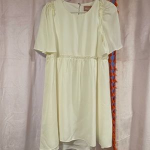 Show me your mumu Brooks babydoll dress size M. Never worn, white in color.